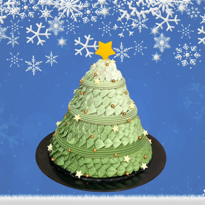 Green Christmas tree cake with gold stars